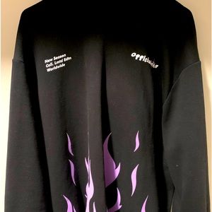 Selling a black & purple hoodie in great condition. Size Large.